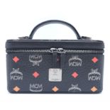 An MCM Rockstar Vanity Case Bag. Leather exterior with leather handle, detachable and adjustable