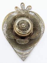 A vintage white metal heart shaped ink well. Very ornate and elaborately designed. Measures 7.5cm