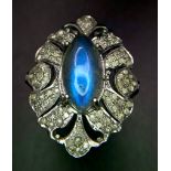 An Art Deco Style Labradorite and Diamond 925 Silver Ring. Central 5ct labradorite cabochon with