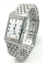 A JAEGER-LECOULTRE "REVERSO" TANK STYLE WATCH IN STAINLESS STEEL 26 X 32mm COMES WITH BOX AND PAPERS