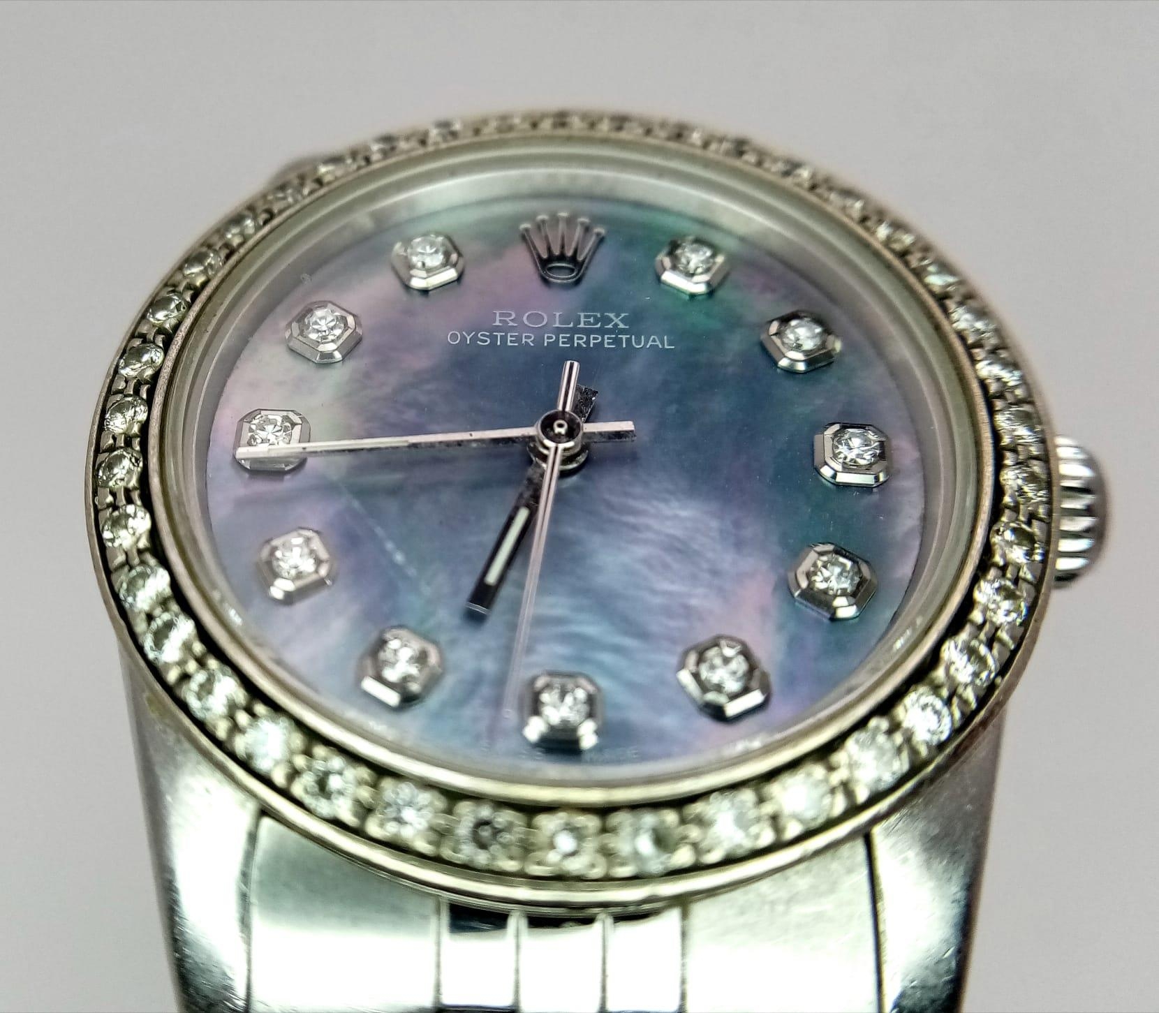 A LADIES ROLEX DRESS WATCH WITH DIAMOND NUMERALS AND BEZEL , MOTHER OF PEARL DIAL AND AUTOMATIC - Image 4 of 10