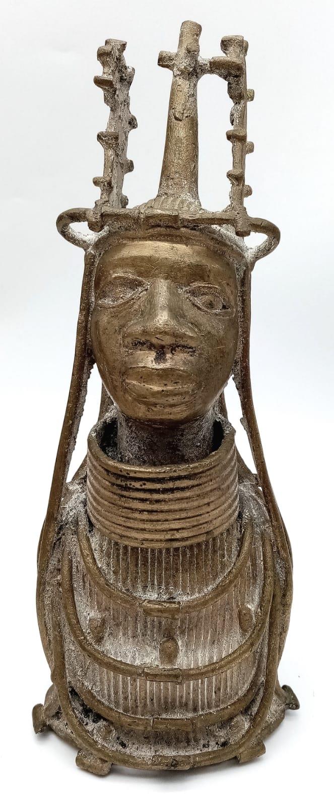 A Unique African Statue. Magnetically tested, no attraction, and when tapped produces a nice ring.
