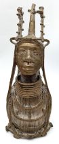 A Unique African Statue. Magnetically tested, no attraction, and when tapped produces a nice ring.