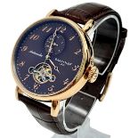 An Earnshaw Automatic Skeleton Gents Watch. Brown leather strap. Rose gold tone gilded case -