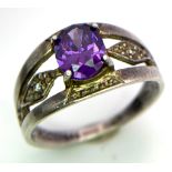 An Amethyst and 925 Silver Ring. Size P.