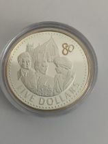 LARGE SILVER 5 DOLLAR COIN. Having 24 carat gold detail. Complete With certificate.