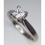 A platinum diamond solitaire ring with a wonderful princess cut diamond (0.43 carats) carrying a