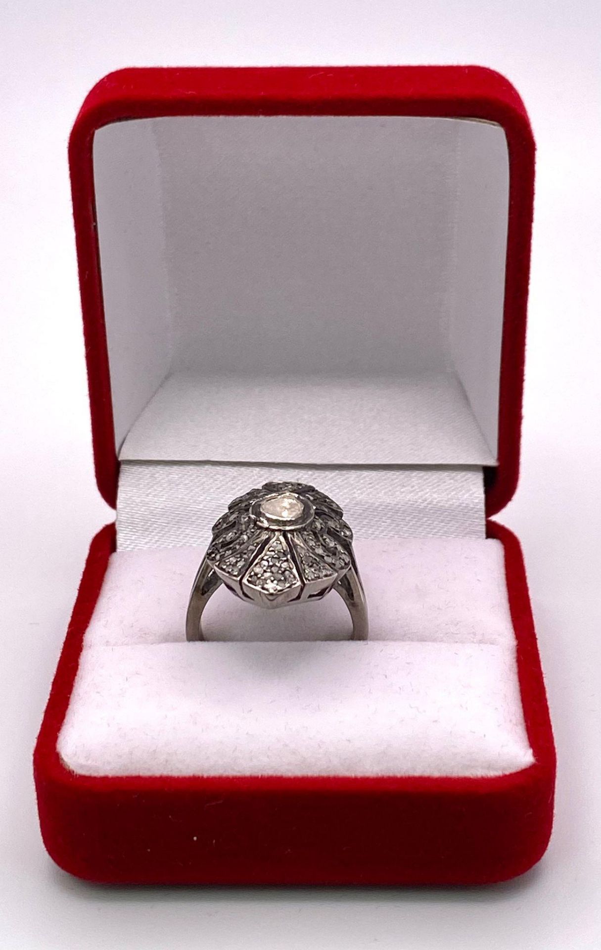 An Edwardian, ART NOUVEAU sterling silver ring with a large natural untreated diamond surrounded - Image 4 of 4