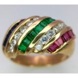 An 18 K yellow gold fancy ring with ruby, emerald and diamond diagonal bands. Ring size: M,