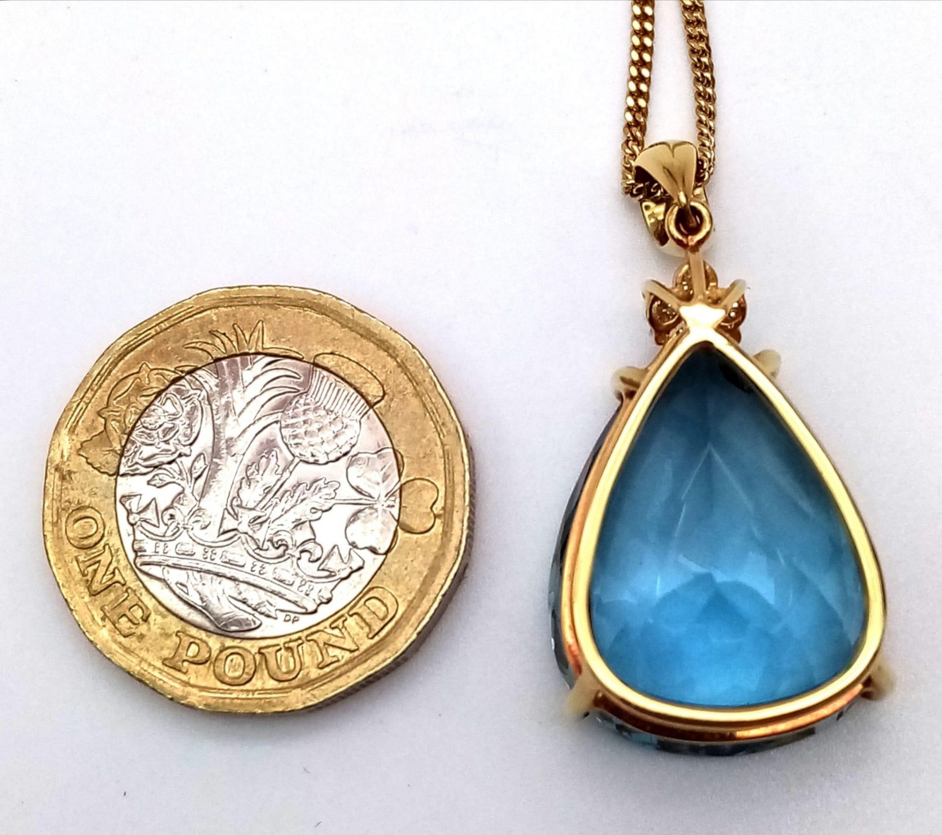 A Captivating 29ct Brazilian Blue Topaz, Diamond and 18K Gold Pendant - On an 18K Yellow Gold - Image 6 of 13