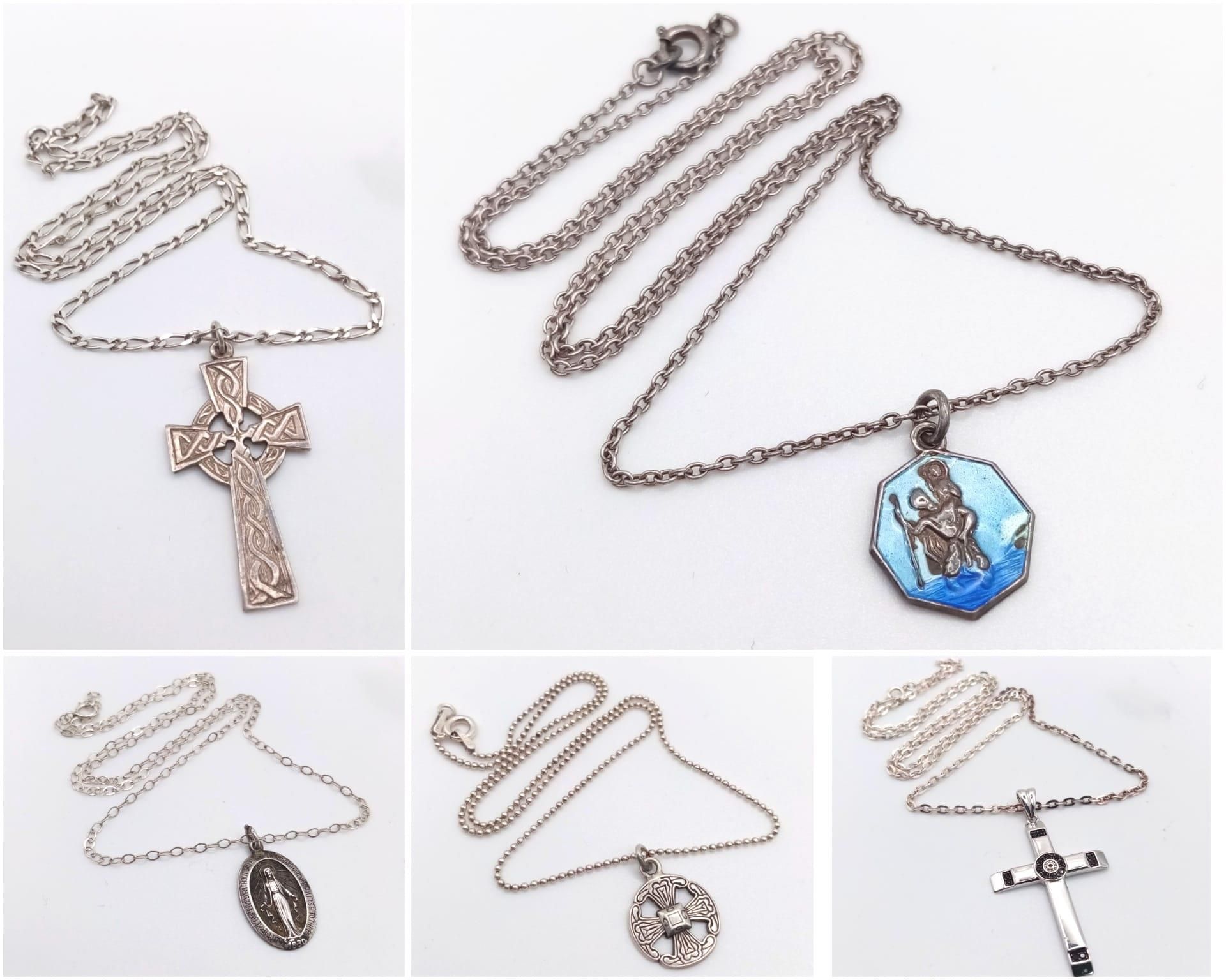 Collection of 5 various Sterling Silver Necklaces. All religious style pendants, various lengths