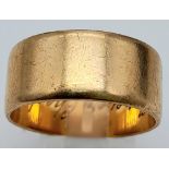 A Vintage 9K Yellow Gold Wide Band Ring. Full UK hallmarks. Size V/W. 1cm wide. 7.88g