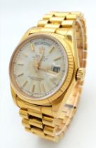 AN 18K GOLD ROLEX OYSTER PERPETUAL DAY-DATE WITH SOLID 18K GOLD STRAP , WHITE DIAL AND AUTOMATIC