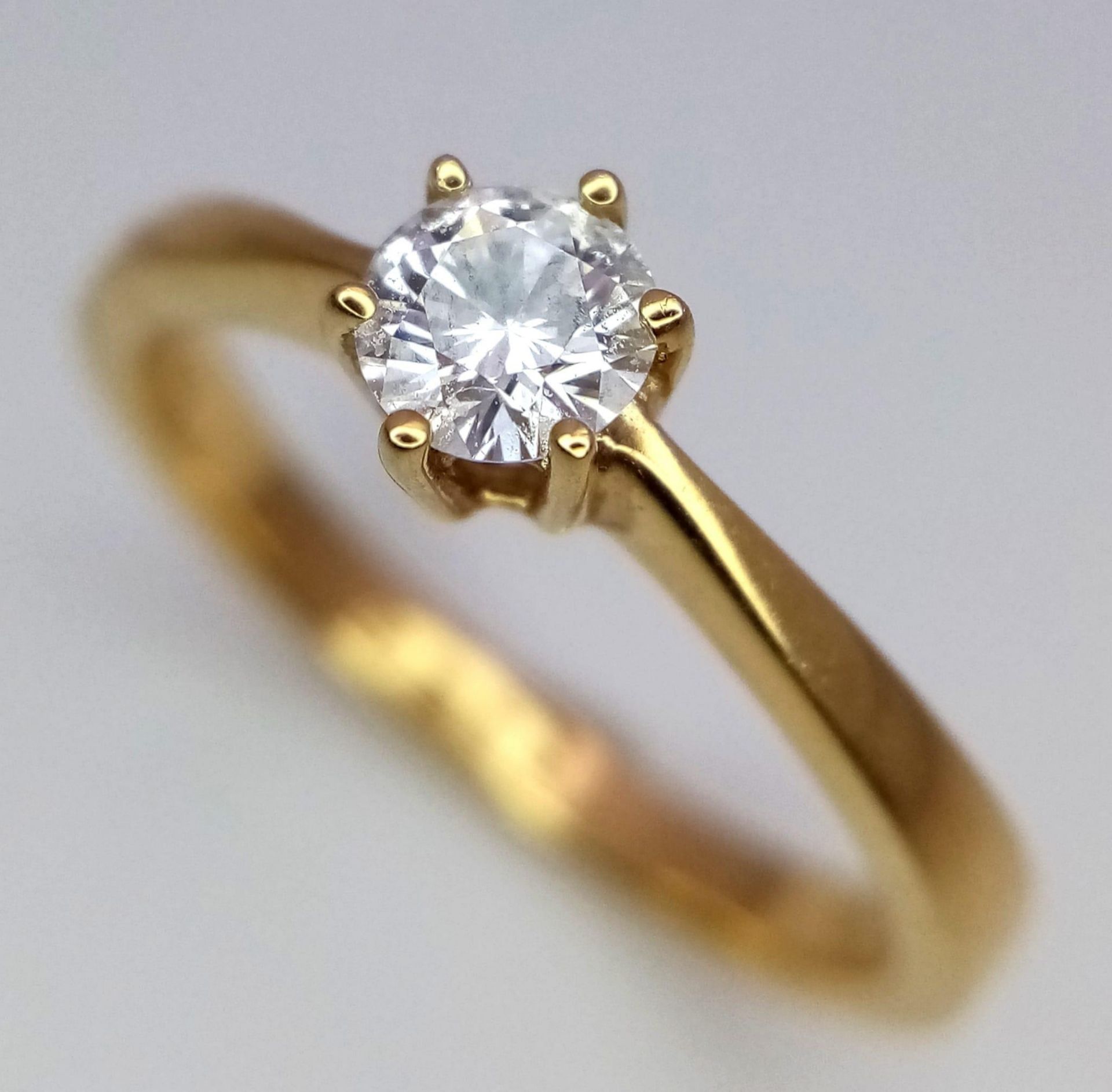 A 18CT YELLOW GOLD DIAMOND SOLITAIRE RING 0.30CT 3.1G SIZE N ref: P172