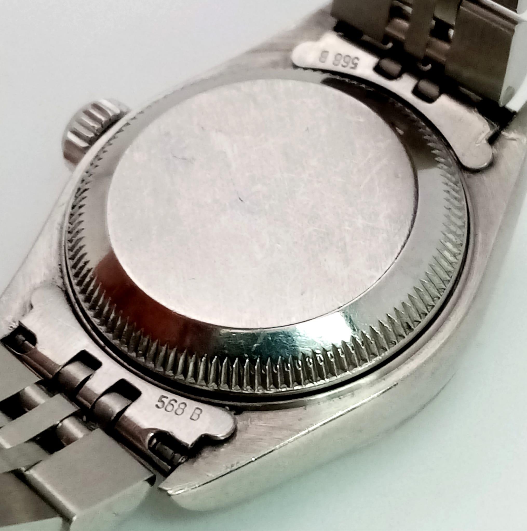 A LADIES ROLEX OYSTER PERPETUAL DATEJUST IN STAINLESS STEEL WITH DIAMOND NUMERALS AND - Image 7 of 8