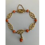 Beautiful 10 carat YELLOW GOLD and CORAL BRACELET Complete with gold safety chain. Having fancy GOLD