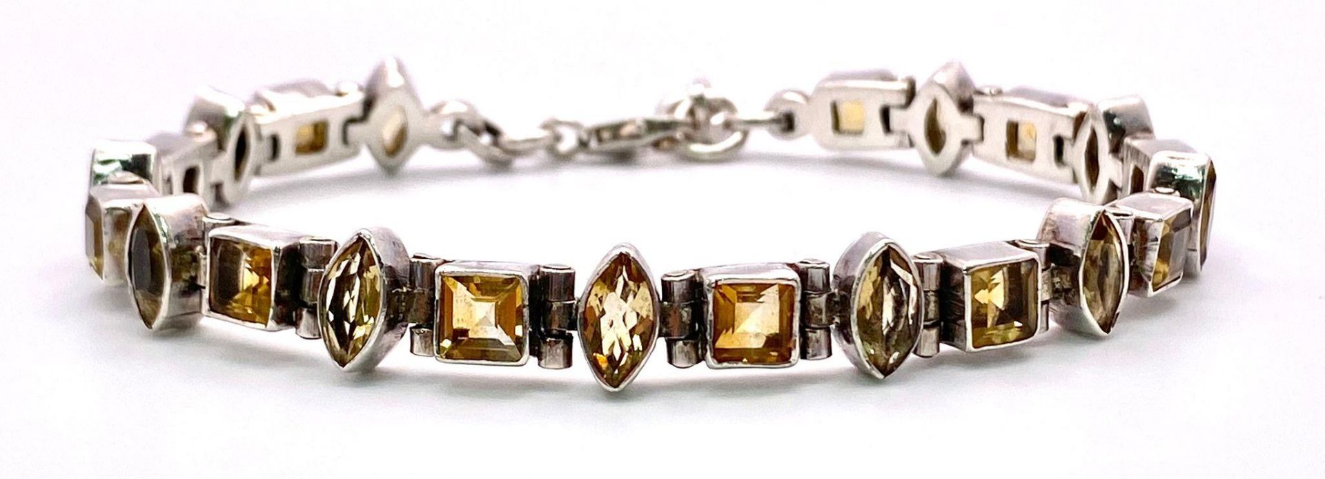 Sterling Silver Multi-Set Marquise & Princess-Cut Citrine Bracelet. Measures 20cm in length. Weight: