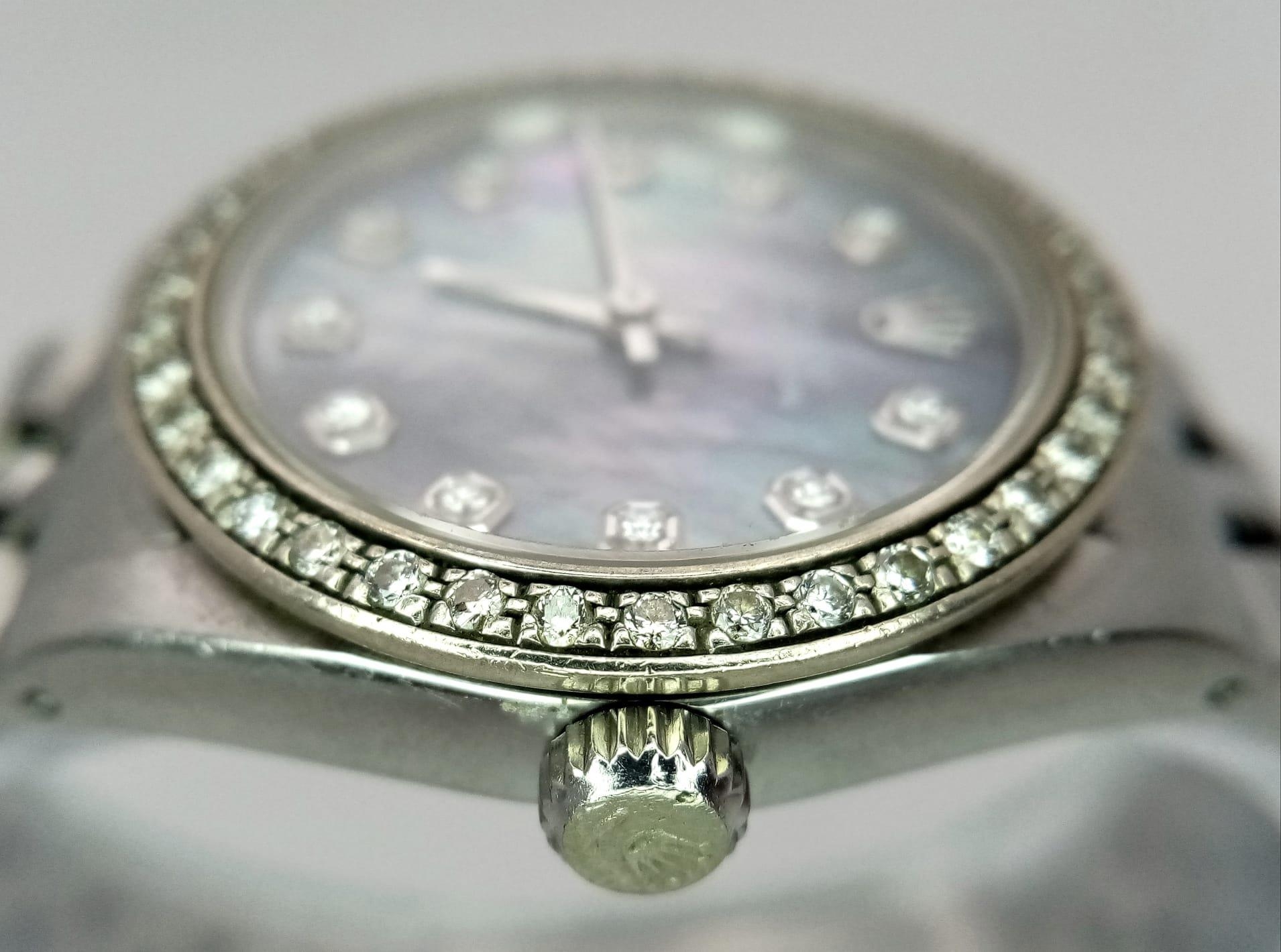 A LADIES ROLEX DRESS WATCH WITH DIAMOND NUMERALS AND BEZEL , MOTHER OF PEARL DIAL AND AUTOMATIC - Image 5 of 10