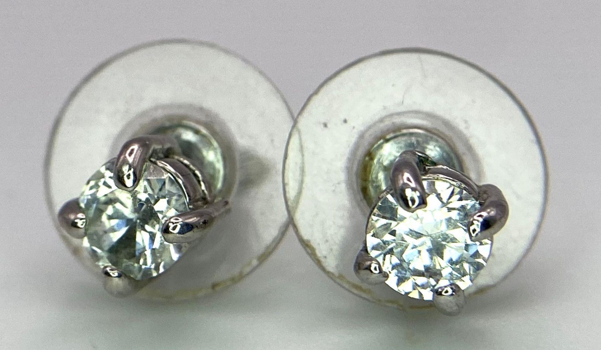 A Pair of White CZ Stone Stud Earrings. - Image 2 of 3