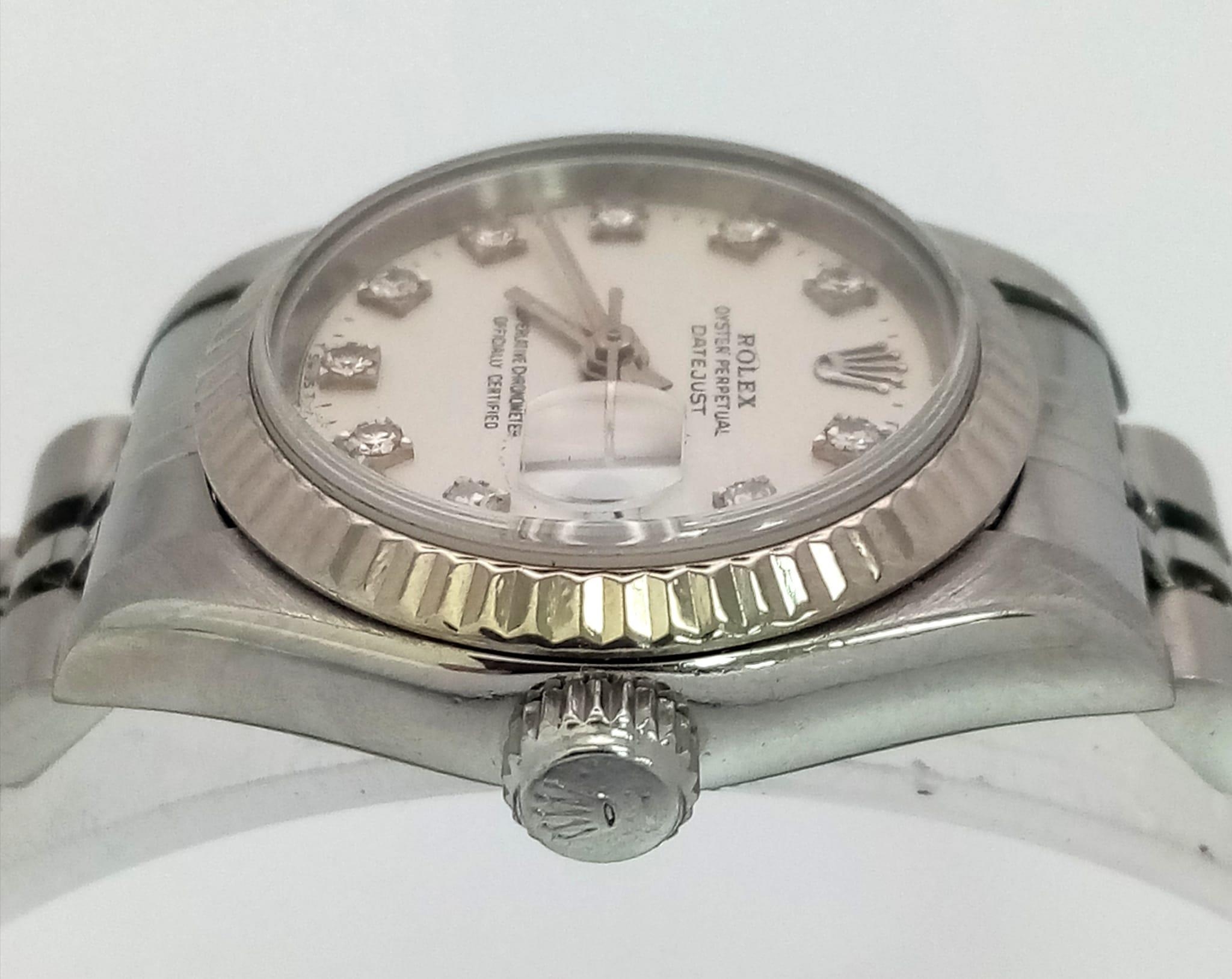 A LADIES ROLEX OYSTER PERPETUAL DATEJUST IN STAINLESS STEEL WITH DIAMOND NUMERALS AND - Image 4 of 8