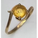 A Vintage 9K Yellow Gold Citrine Crossover Ring. Size L. 1.11g total weight.