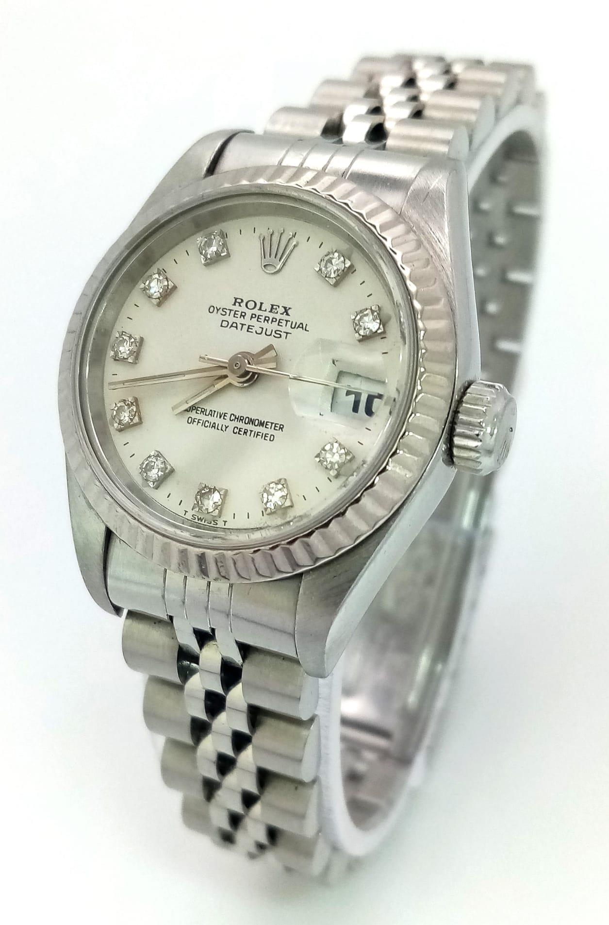 A LADIES ROLEX OYSTER PERPETUAL DATEJUST IN STAINLESS STEEL WITH DIAMOND NUMERALS AND