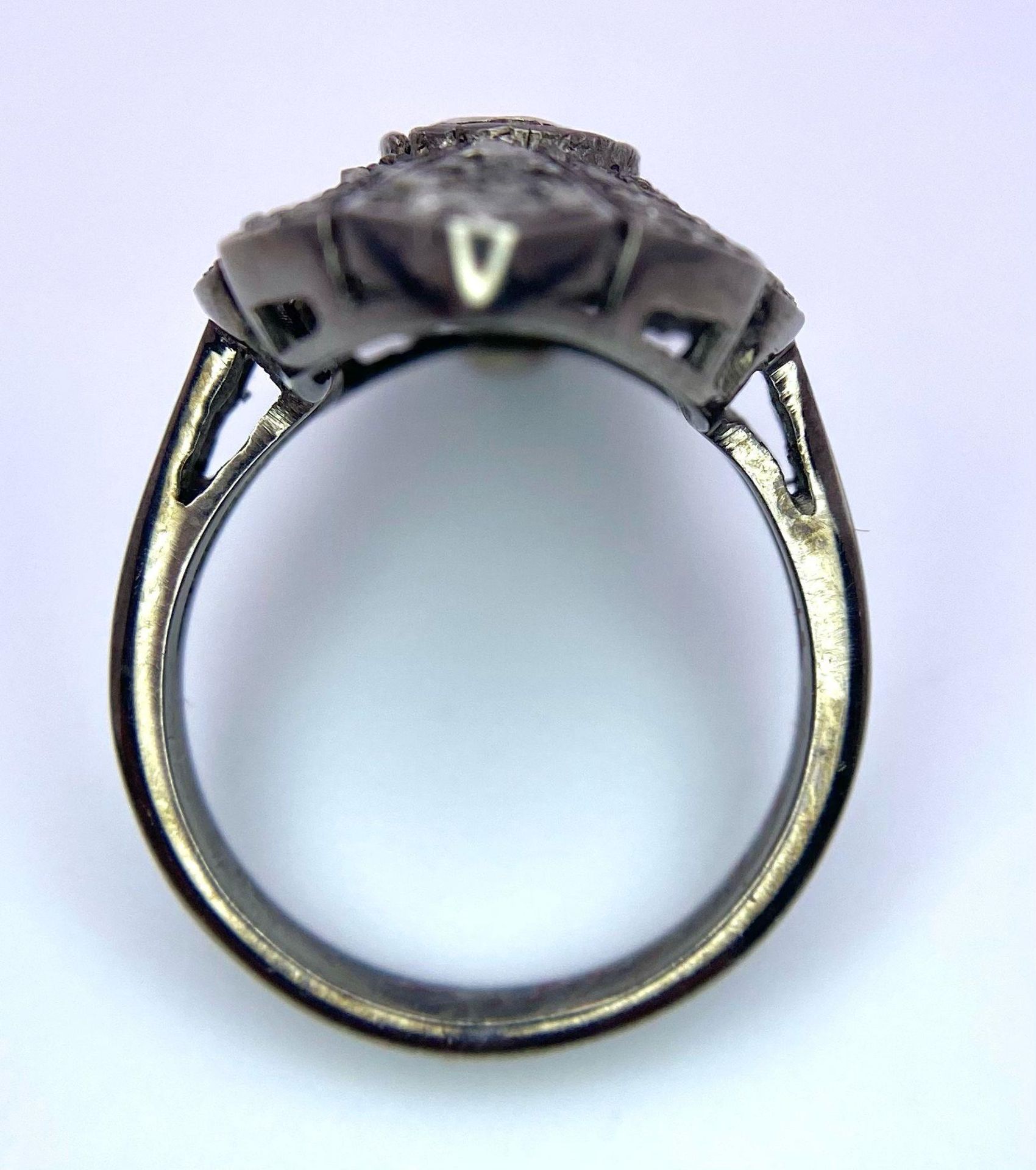 An Edwardian, ART NOUVEAU sterling silver ring with a large natural untreated diamond surrounded - Image 3 of 4