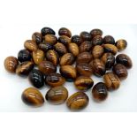 40 Tigers Eye Egg Shaped Stones. Each stone is 20g per stone. Over 800 grams of this beautiful