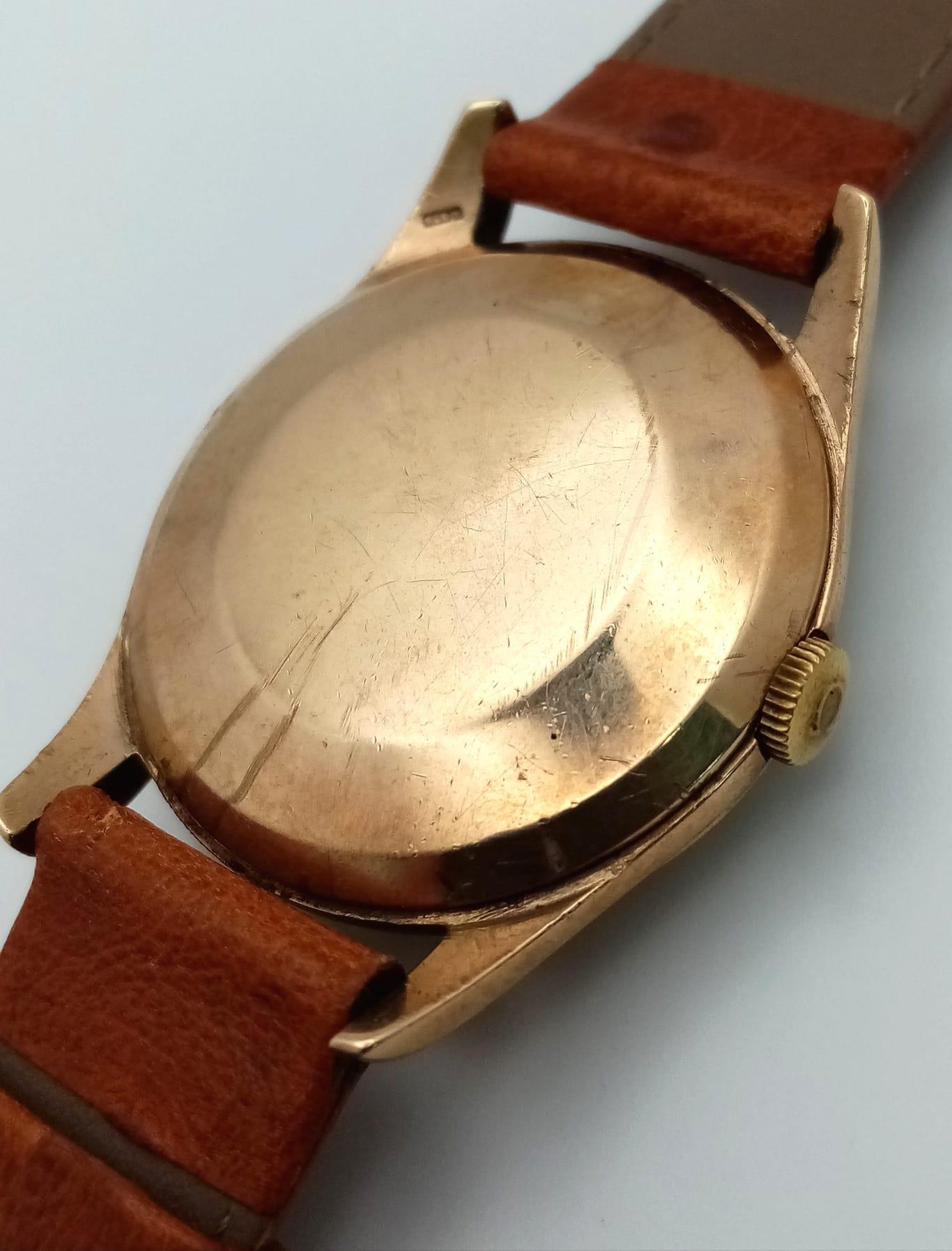 A 9K YELLOW GOLD CASED OMEGA WATCH ON TAN LEATHER STRAP. FULL WORKING ORDER ref: MB 5001 - Image 6 of 7