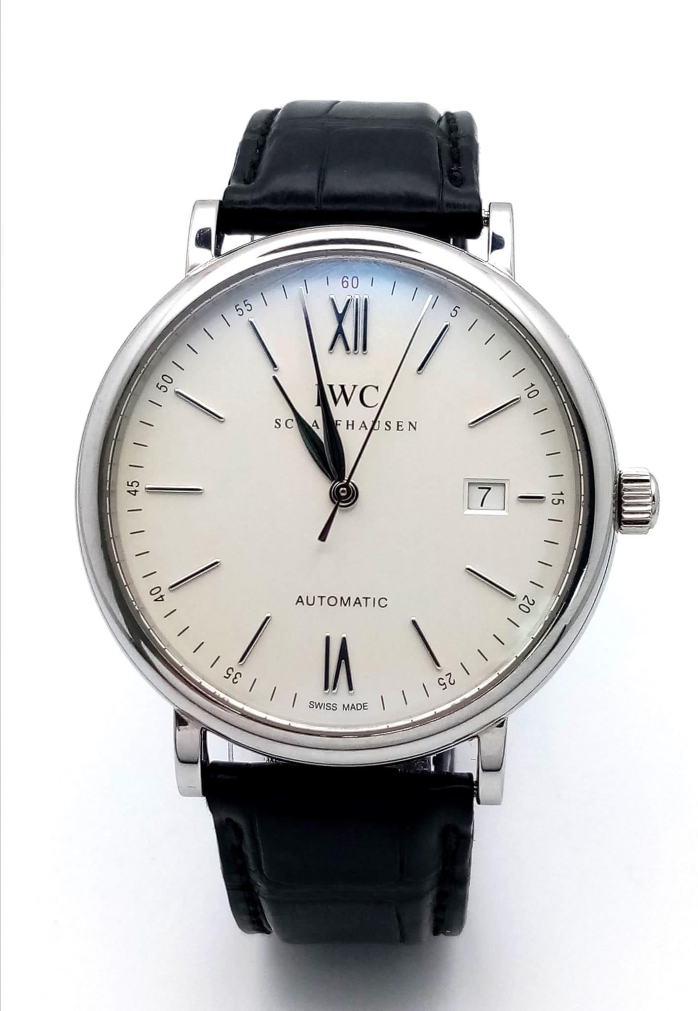 AN I.W.C. SCAFFHAUSEN AUTOMATIC GENTS WATCH IN STAINLESS STEEL WITH CREAM DIAL AND DATE BOX . 40mm
