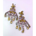 A Pair of Ruby and Citrine Spectre Drop Earrings. Set in 925 silver. Ruby & Citrine - 13ctw. 12.4g