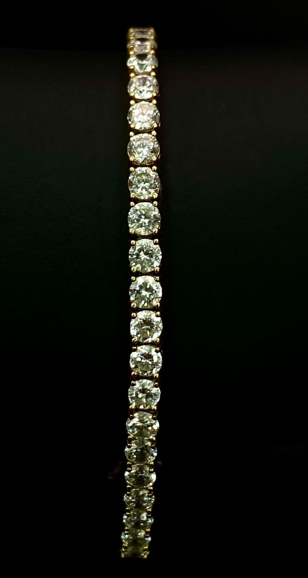 A STUNNING 14K GOLD TENNIS BRACELET WITH BRIGHT SPARKLING ZIRCONIA STONES. 9.8gms - Image 2 of 5