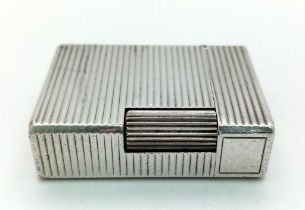 A Vintage ST Dupont Silver Plated Lighter. Needs gas and flint. 4.5 x 3.5cm. UK Mainland Sales Only