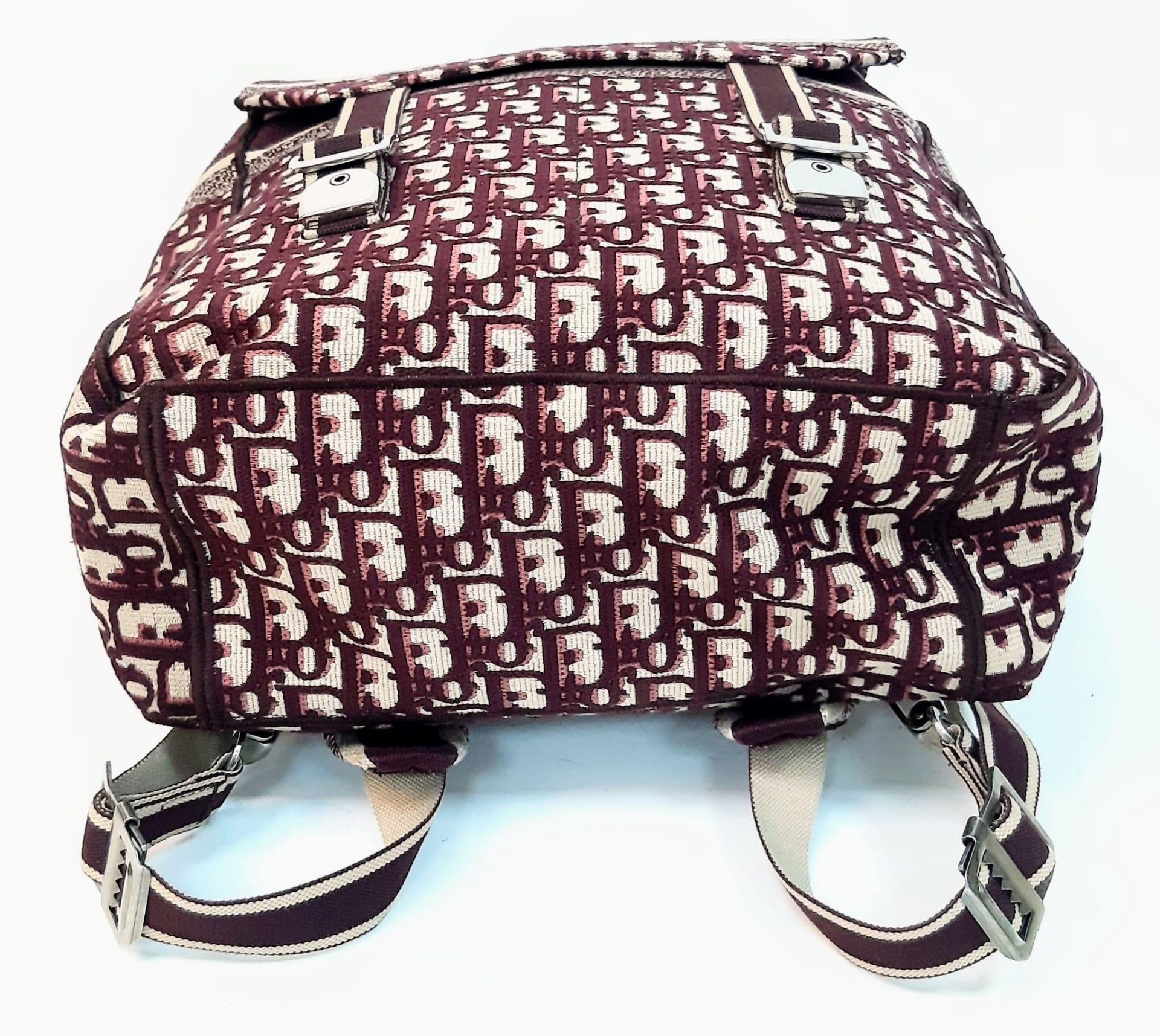 A Christian Dior Burgundy Monogram Backpack. Canvas exterior, with silver toned hardware, flat - Bild 5 aus 8