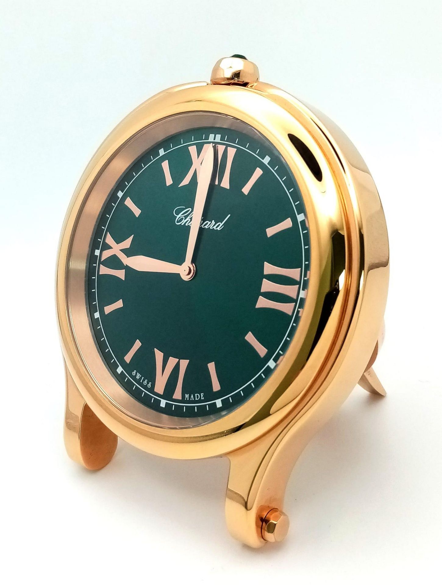 A Chopard Happy Sport Rose Gold Plated Table Clock. Quartz movement. Green dial with Roman numerals.