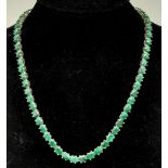 An Emerald Gemstone Tennis Necklace set in 925 Silver. 47cm length. 40g total weight.