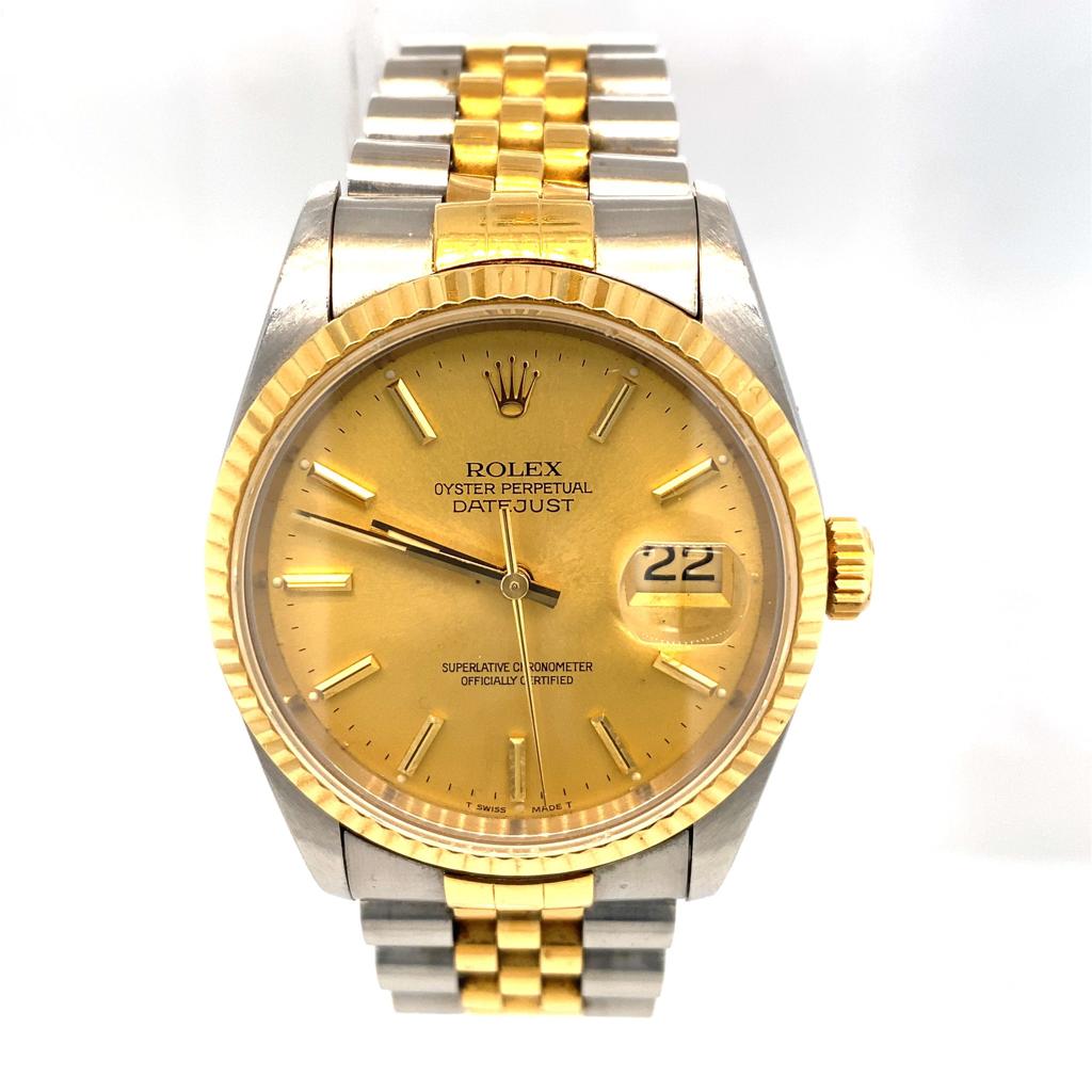 A Rolex (1993) Datejust Bi-Metal Gents Watch. 18k Gold bracelet and case - 36mm. Champagne dial with