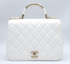 Chanel Carry Chic Bag. Lamskin throughout, front single flap is quilted with diamond stitching.