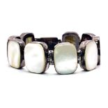 A Vintage Style Mother of Pearl and 925 Silver Bracelet. Rectangular slices of MoP set in brushed