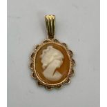 A Small Vintage 9K Gold Cameo Pendant. 25mm. 1.43g total weight.