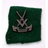 WW2 British “V” Force Special Forces Cap Badge.