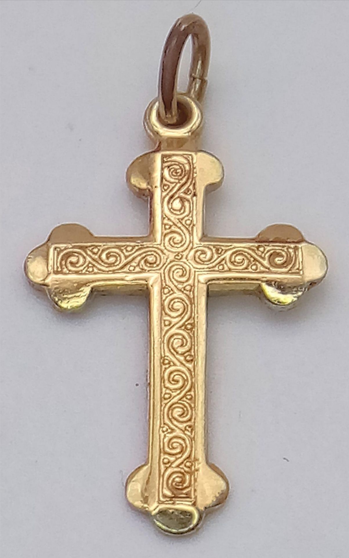 A Vintage 9K Yellow Gold Cross Pendant/Charm. 2cm. 0.7g weight.