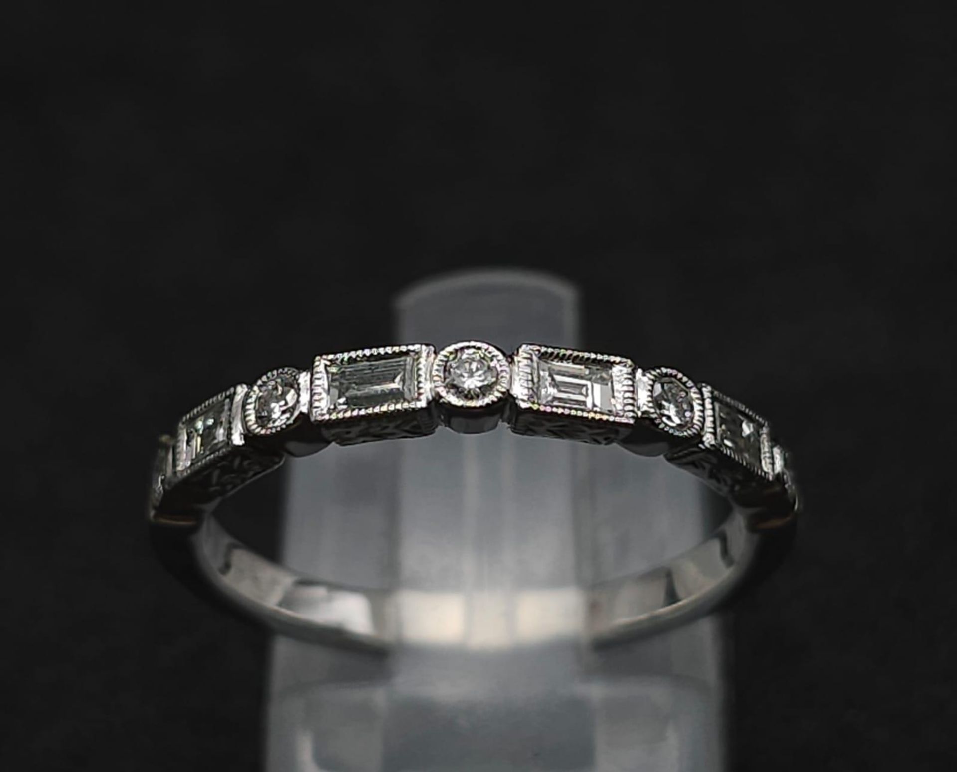 A 9K White Gold and Diamond Half Eternity Ring. Size N. 2g total weight. - Image 2 of 7