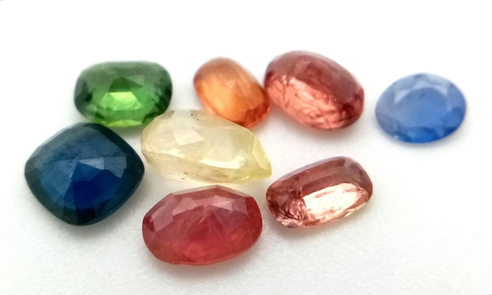 A 4.85ct Ceylon Mine Sri Lankan Sapphires Faceted Gemstones Lot of 8 Pieces. Mixed Shapes. - Image 2 of 3