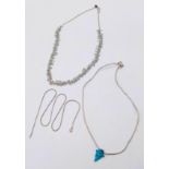 Trio of Sterling Silver Necklaces. One plain necklace, one with a turquoise pendant and the third