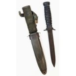 WW2 US Paratroopers M3 Fighting Knife Dated 1943. Makers name on the cross guard, flaming bomb stamp