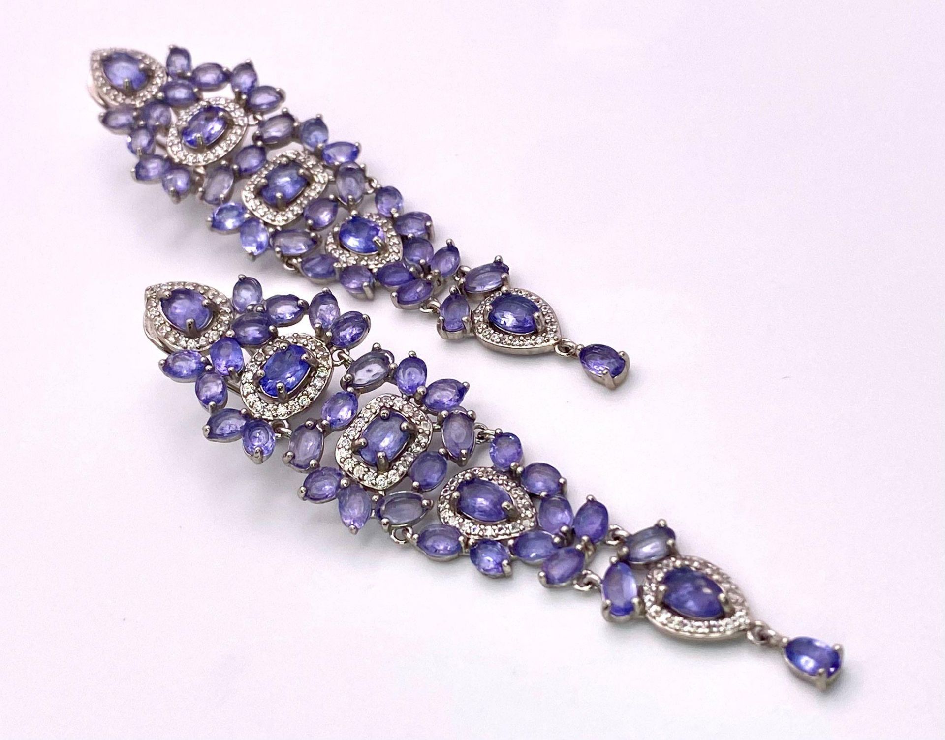 A pair of vintage Tanzanite and white sapphire long earrings, excellent condition, no missing