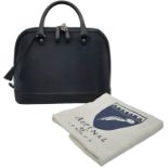An Aspinal Black Hepburn Bag. Lizard print leather exterior with rolled leather handles, silver