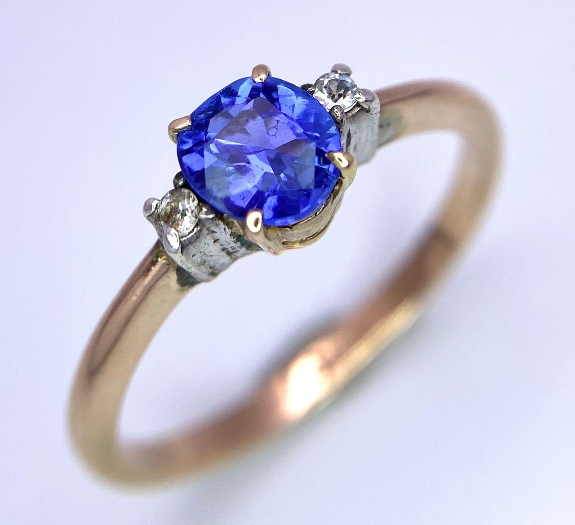 A 14k yellow gold blue and clear stone dress ring size N 2.1g