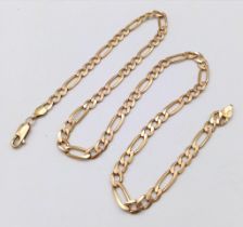 A 9K GOLD FIGARO LINK NECK CHAIN . 11.3gms